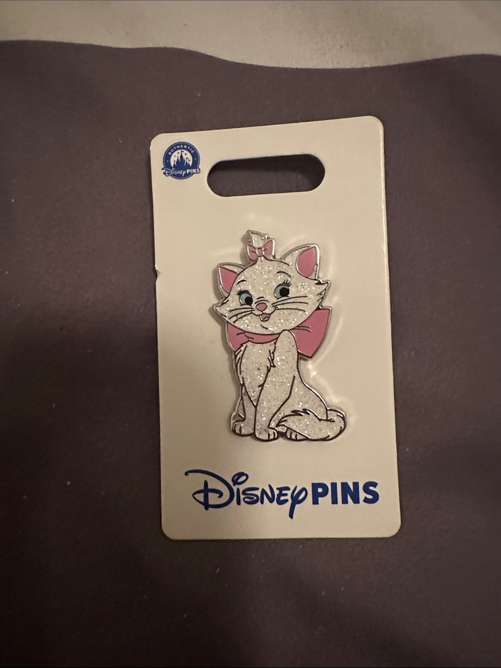 Disney White Glitter Marie Pin with Pink Bow
